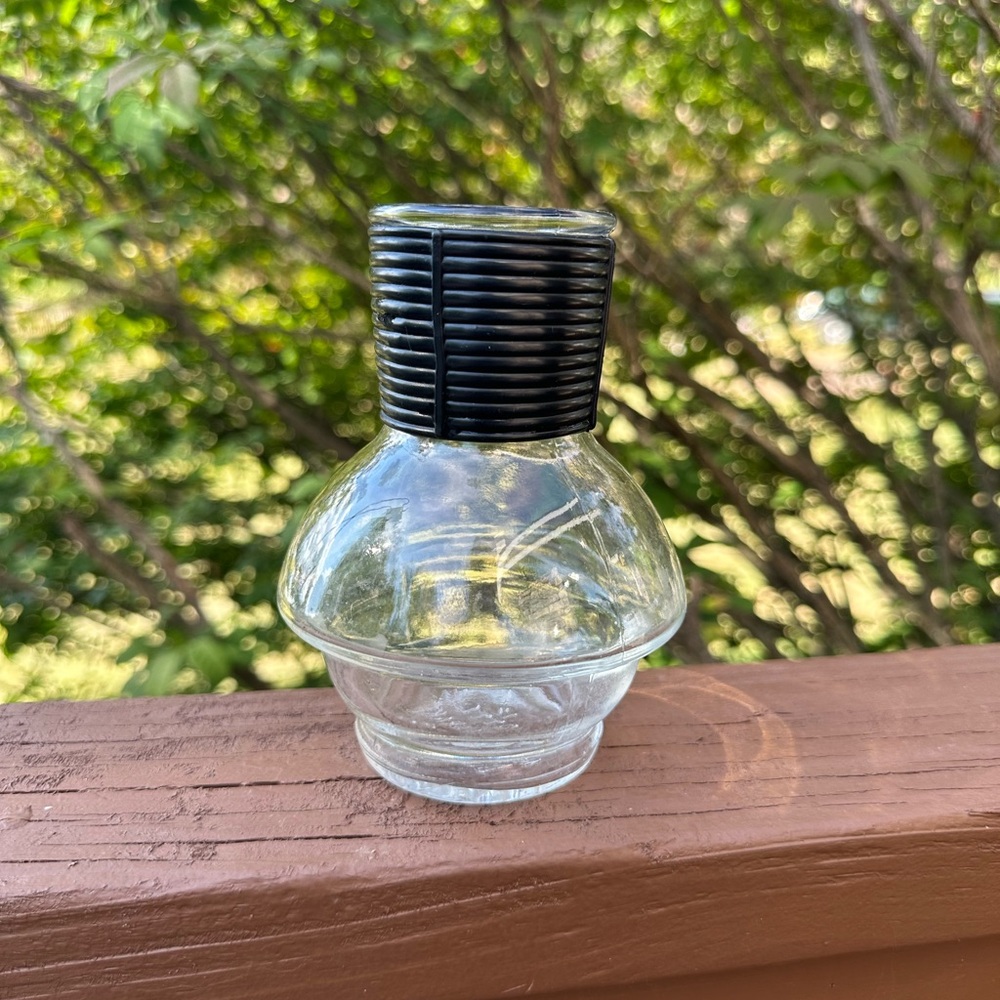 Elegant Black and Clear Glass bottle